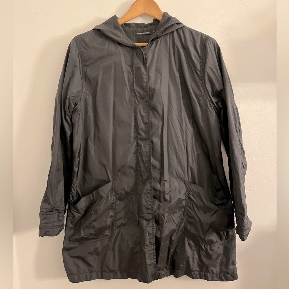 Simple black hooded raincoat